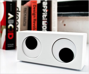 moving eyes table clock