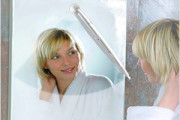 Wiper to clear steam off bathroom mirror