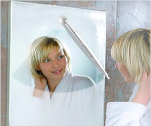 Wiper to clear steam off bathroom mirror