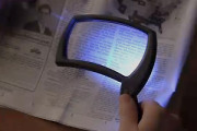 Magnifier glass with LED light for old senior people