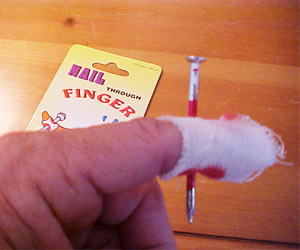 nail through finger prank gift