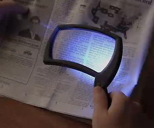 Magnifier glass with LED light for old senior people