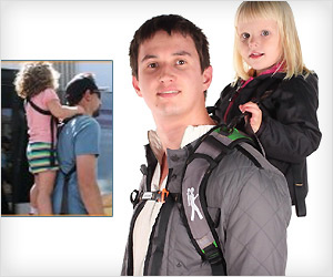 Piggyback carrier where child stands on foot-bar